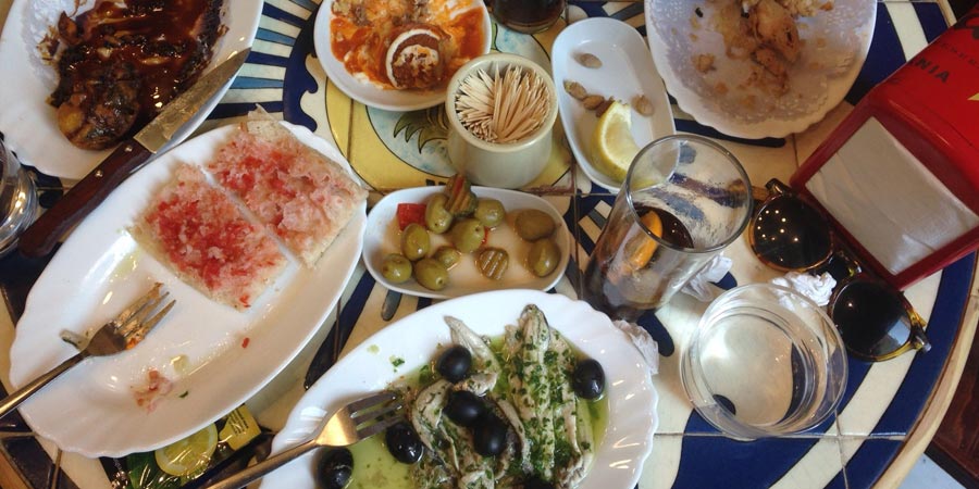 Our Tapas Lover Tour guests rarely leave a crumb on their plates! a bunch of food on a plate