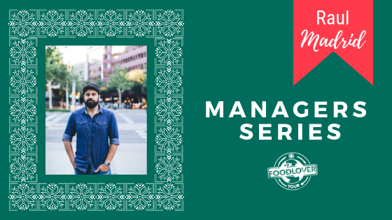 Managers-series-Raul-blog-image a person holding a sign