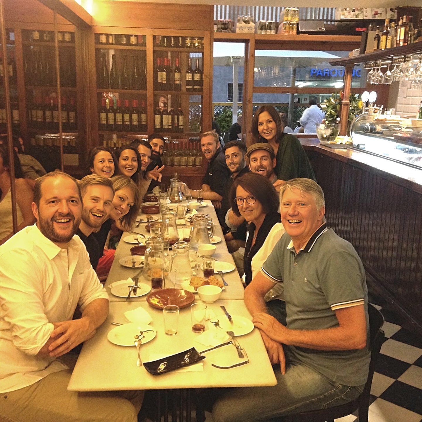 a group of people sitting at a table