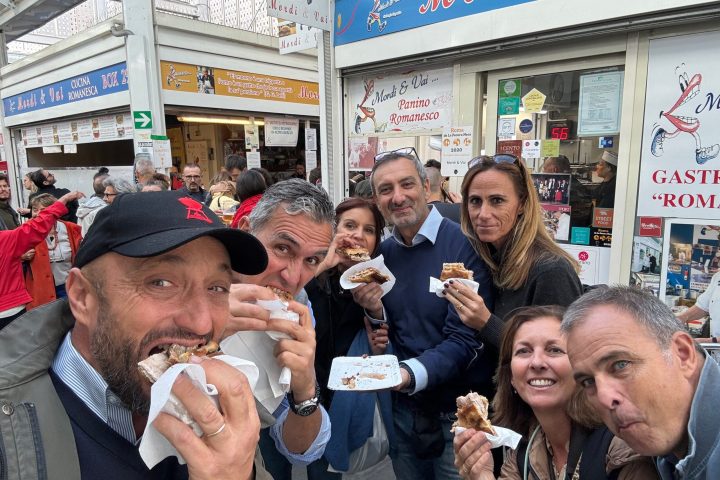 a group of people eating food