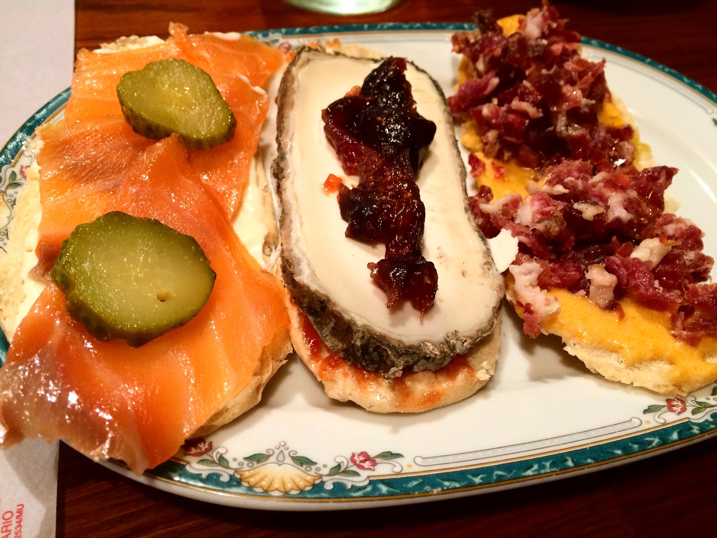 a plate of food with a slice of pizza