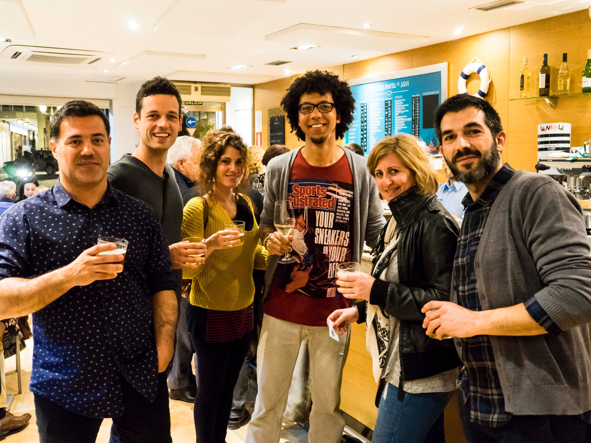 a group of people posing for the camera