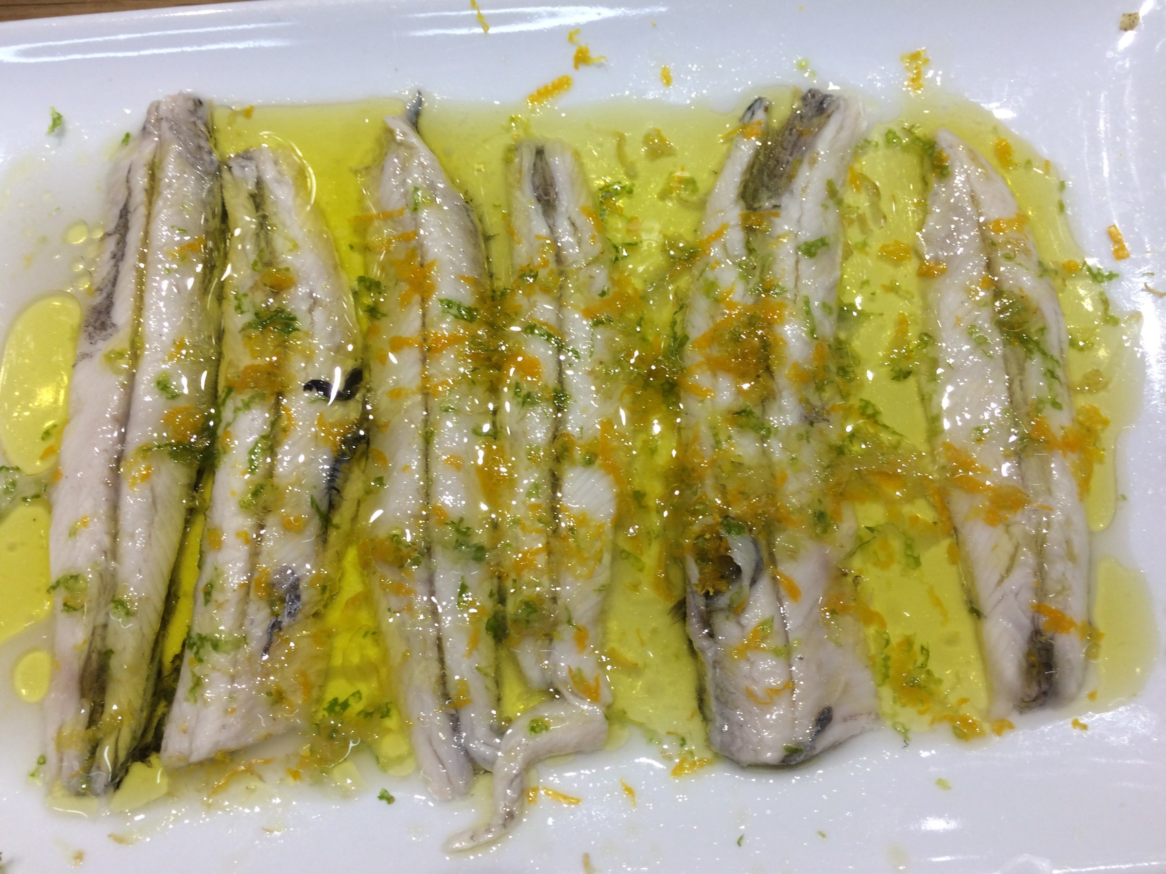 a hot dog covered in cheese