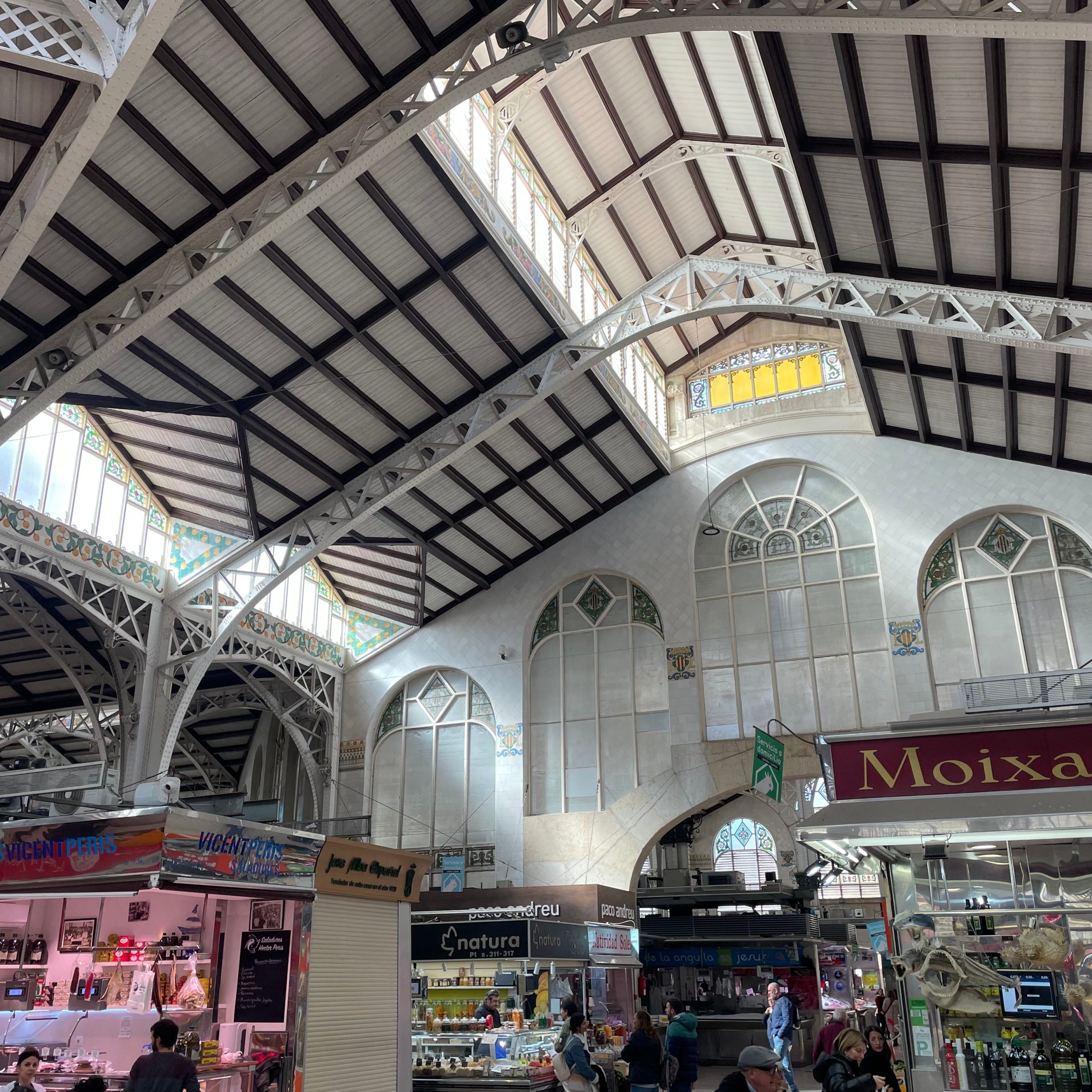 a group of people standing in front of a building