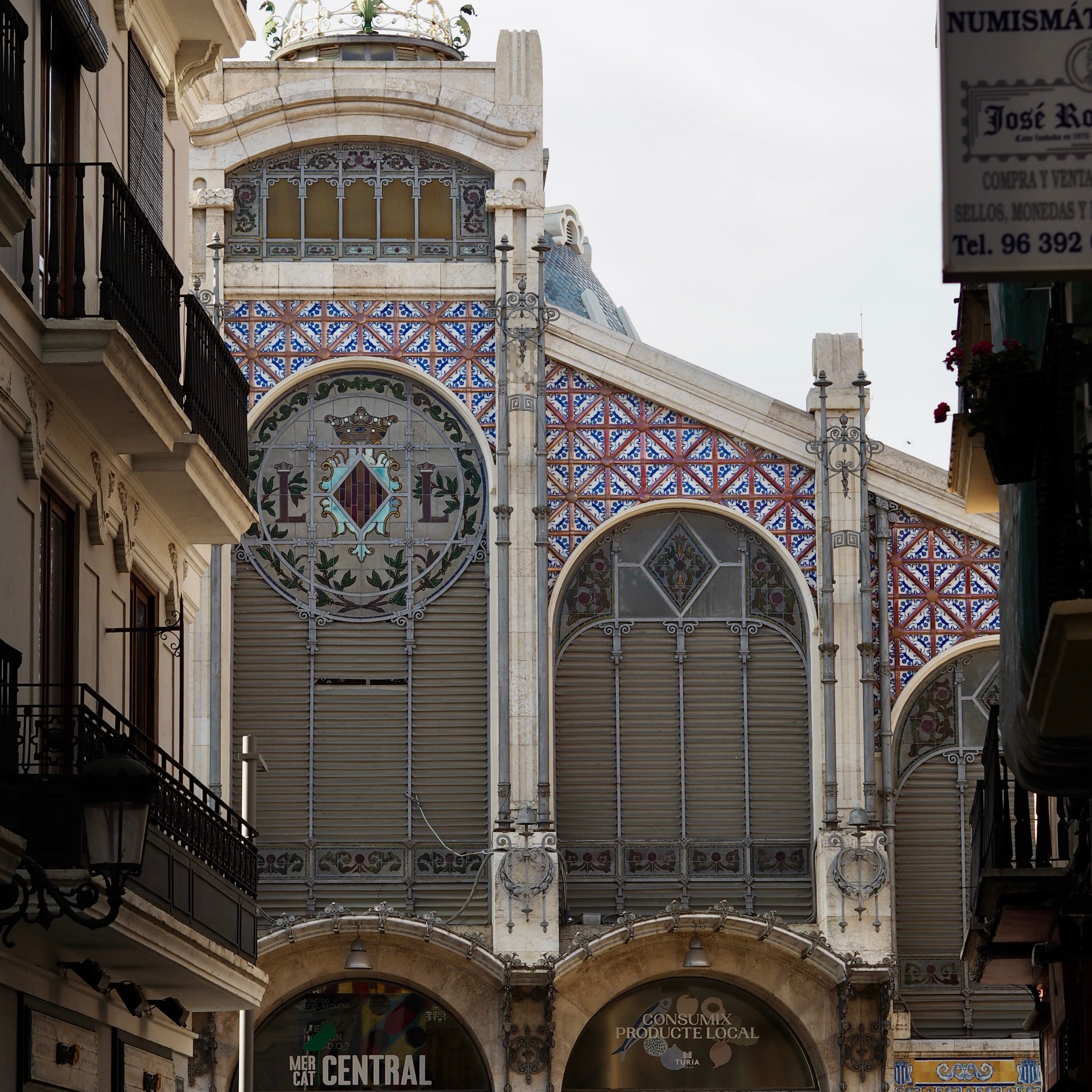 a large clock mounted to the side of a building