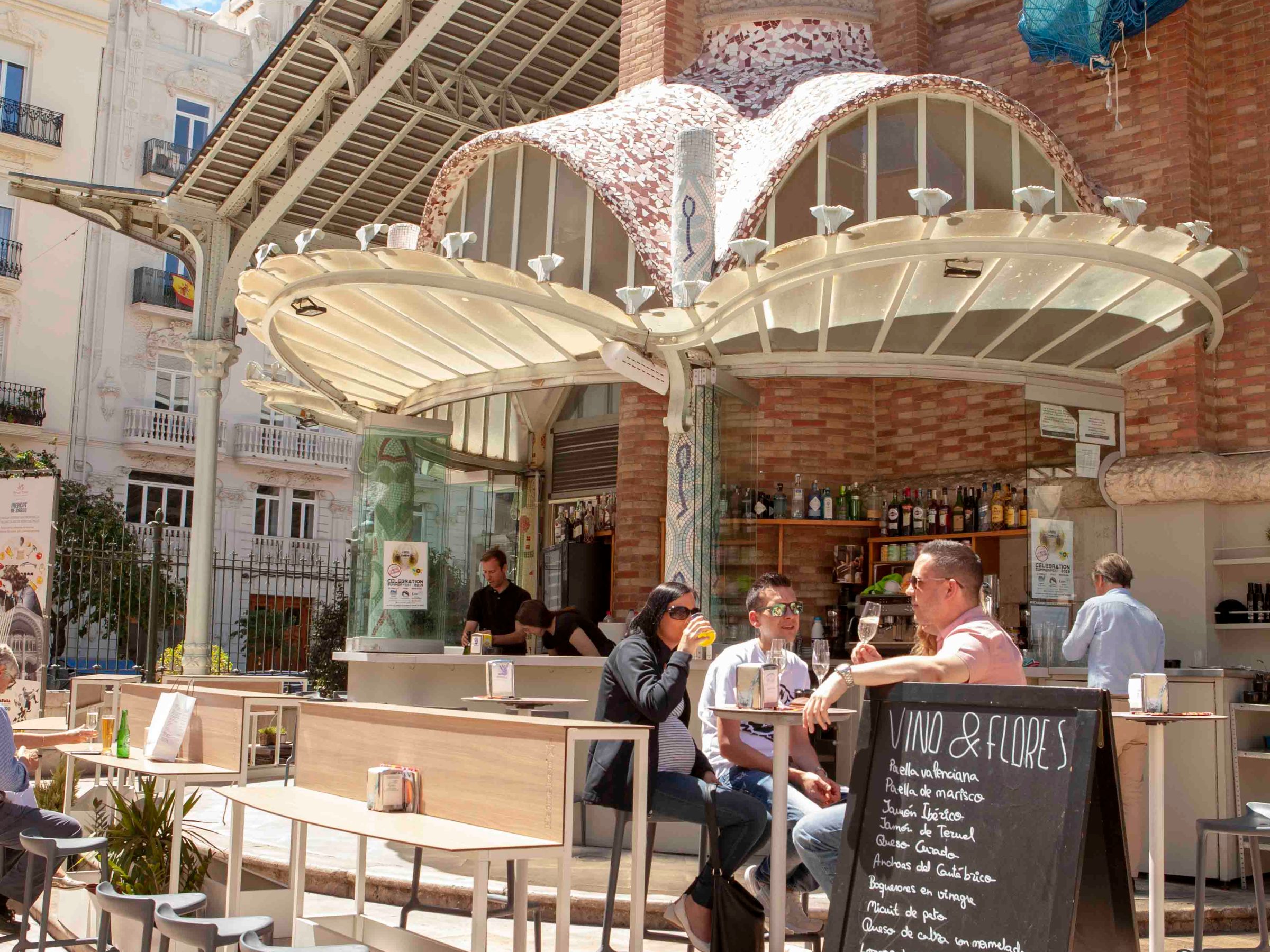 a group of people in front of a building