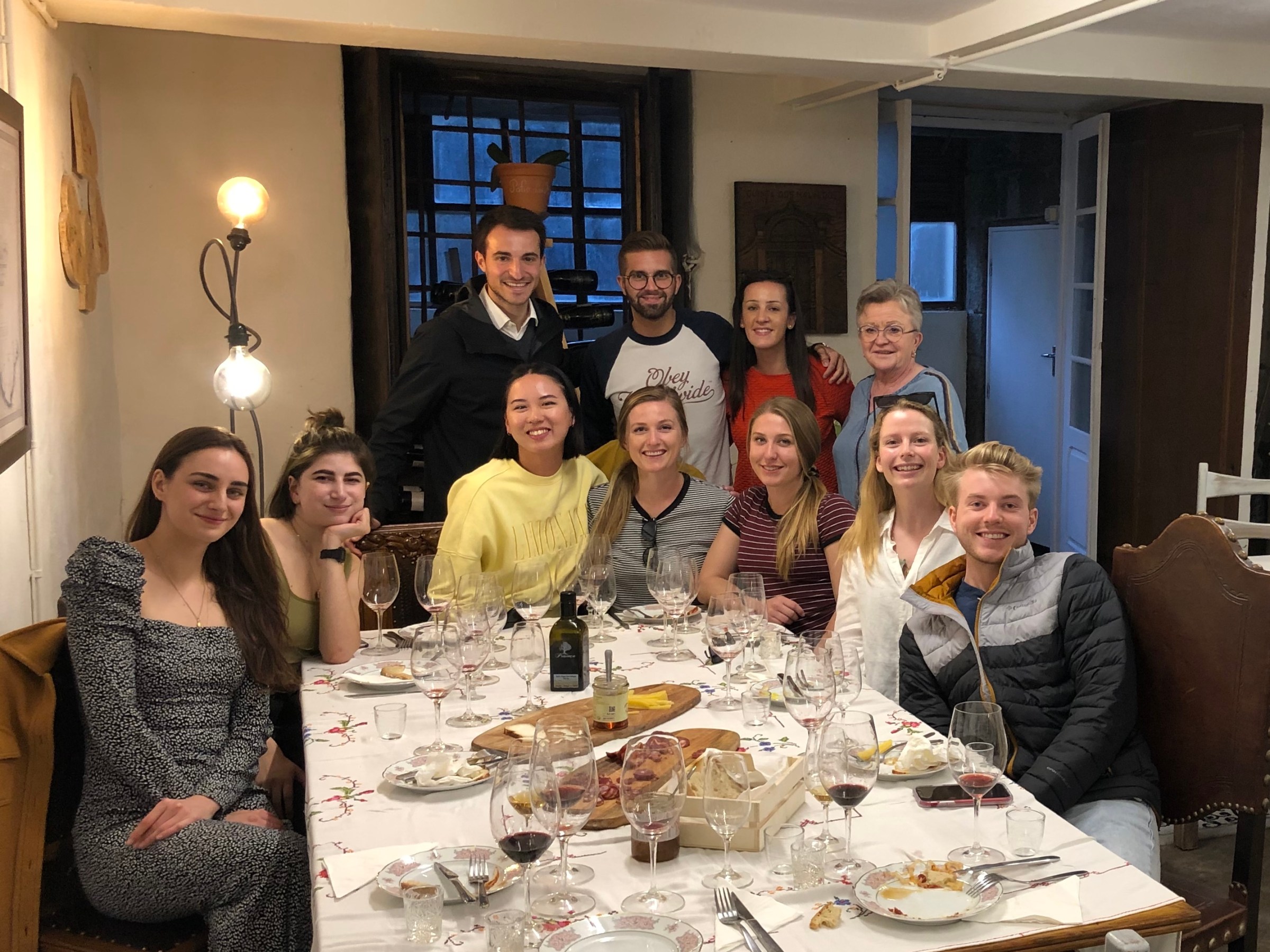 people enjoying good food and wine during our porto food tour