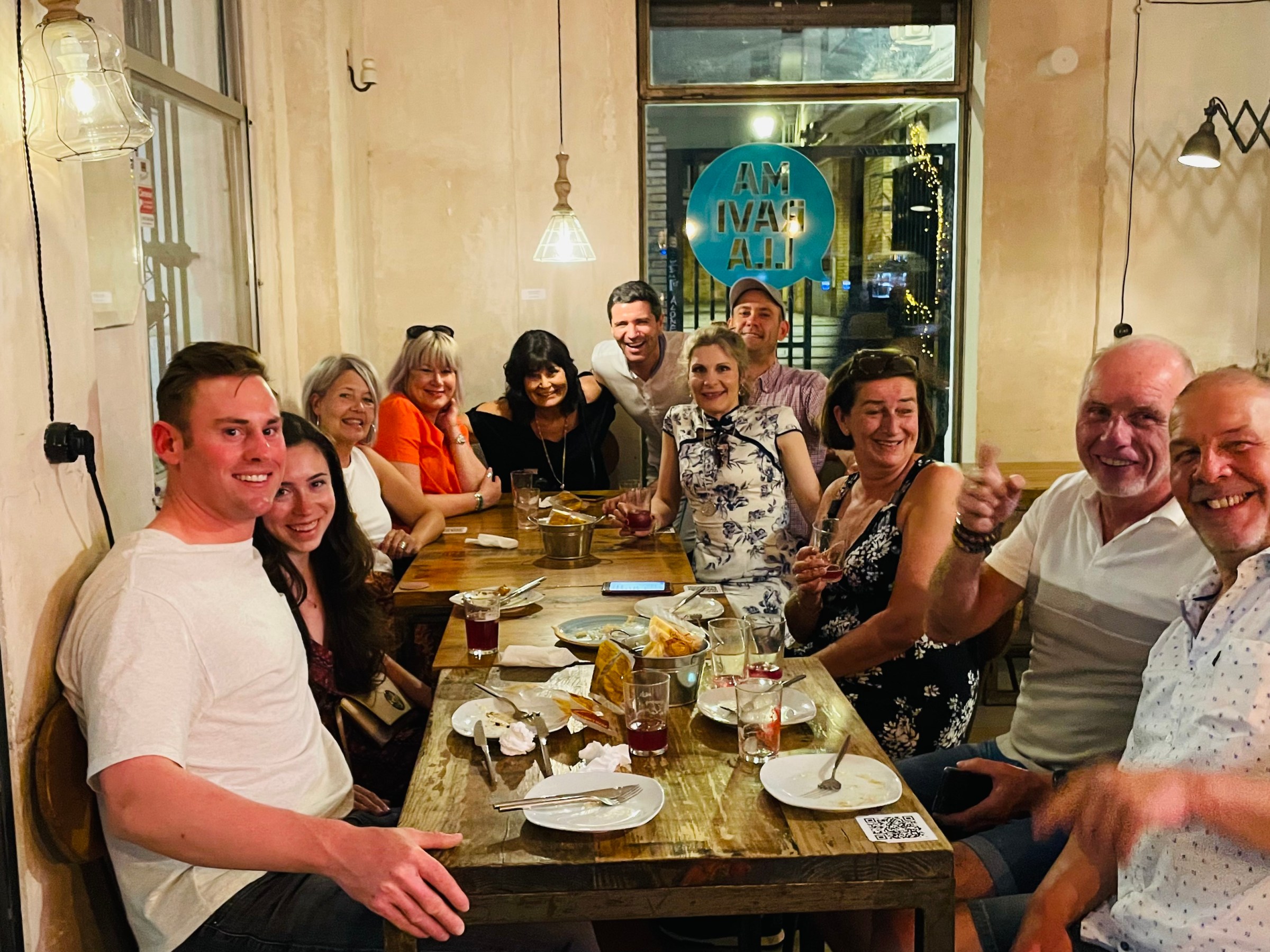 a group of people sitting at a table