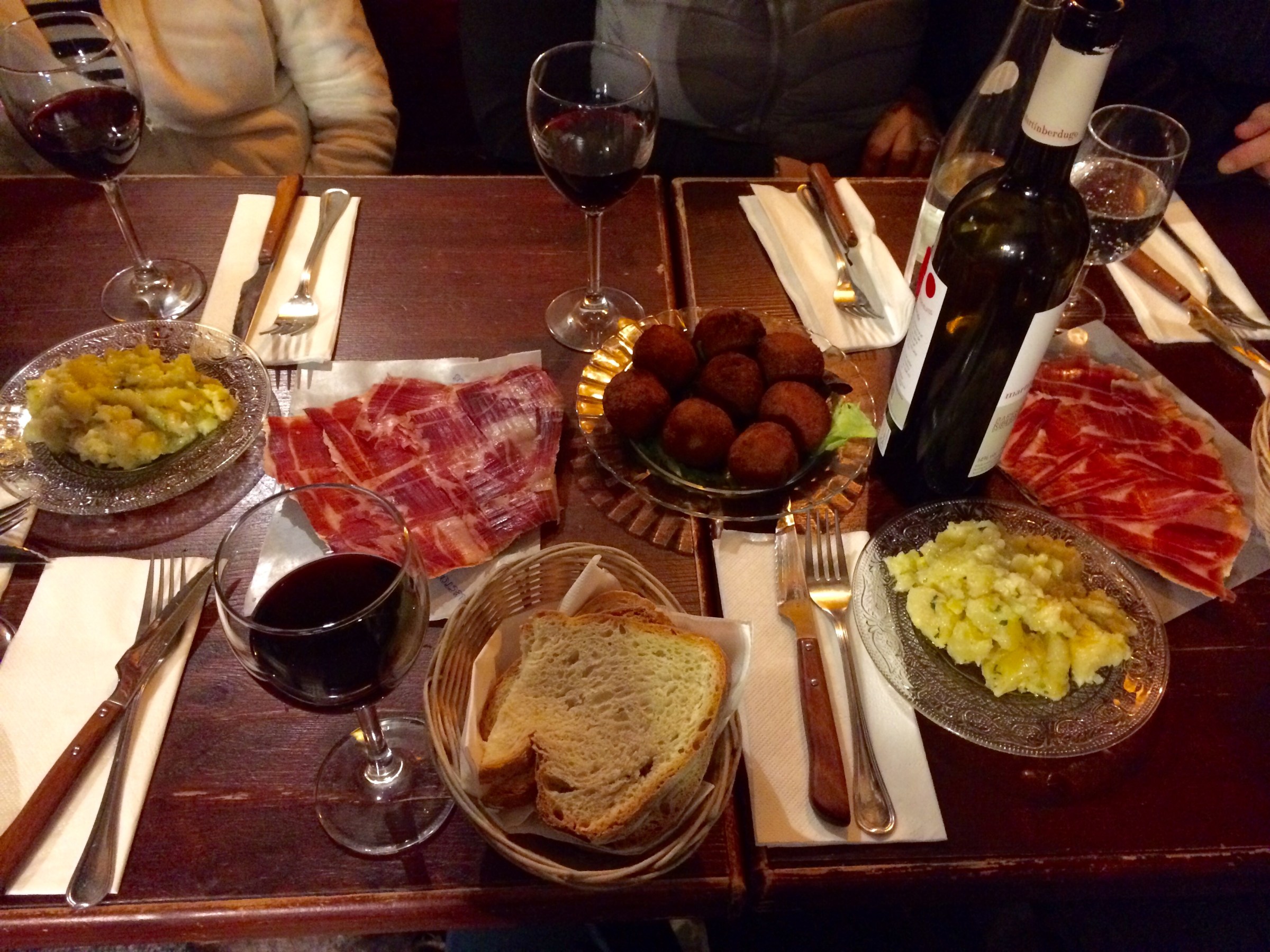 a table topped with plates of food on a plate