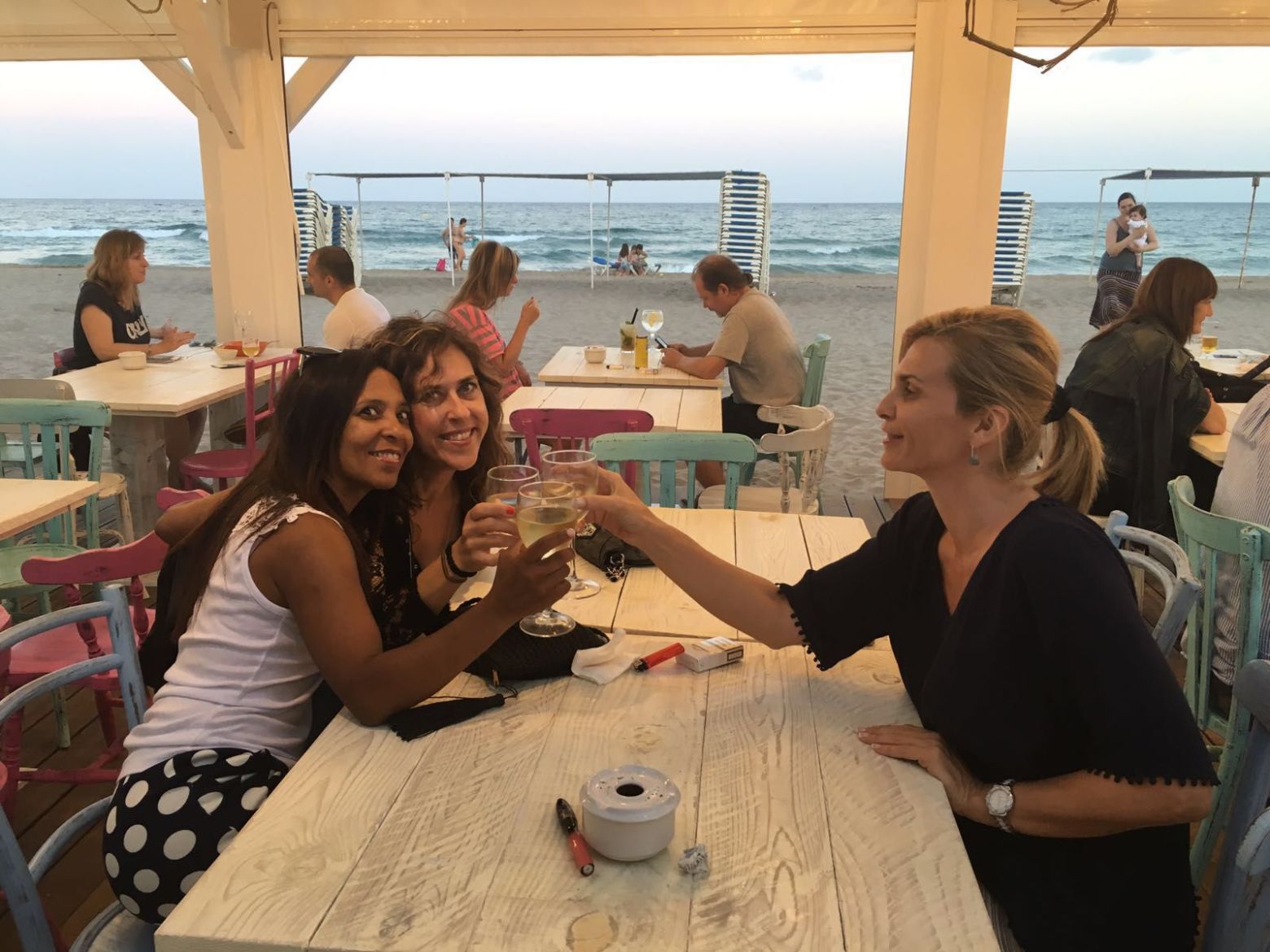 a group of people sitting at a table