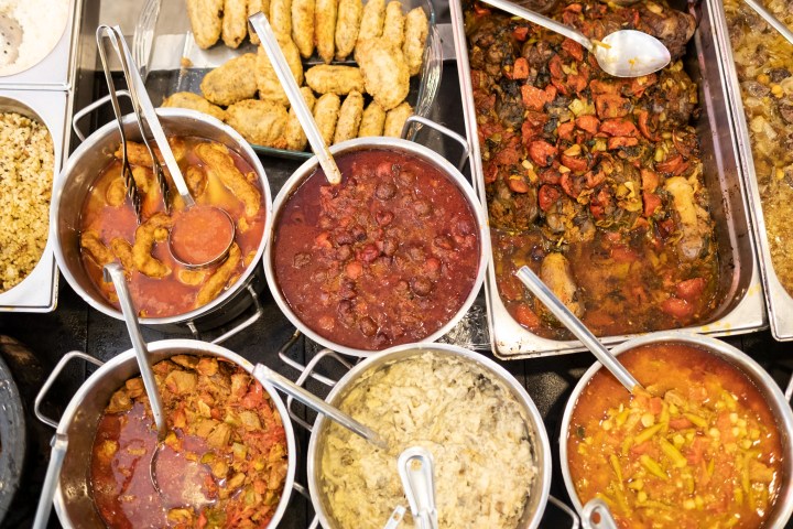 a bowl filled with different types of food on a table