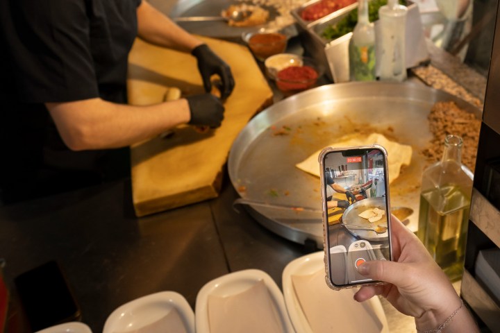 a person cooking food on a table