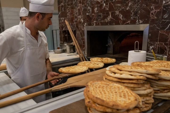 a man that is cooking some food