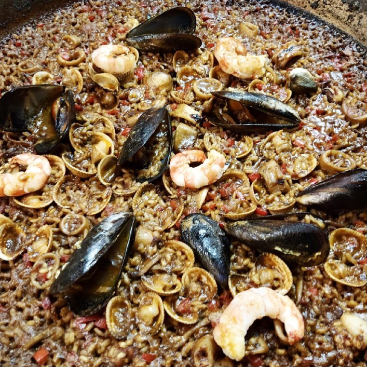 a pizza sitting on top of a pan