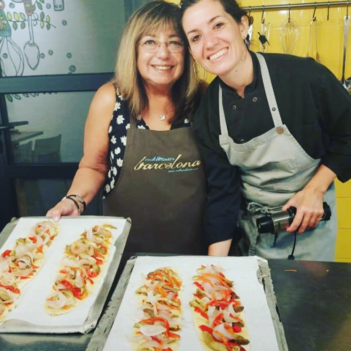 a person standing in front of a cake