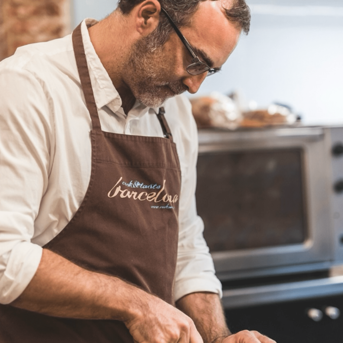 a man cutting food on a table
