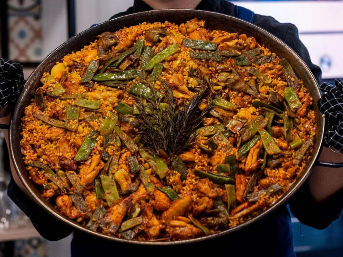 a close up of a metal pan filled with food