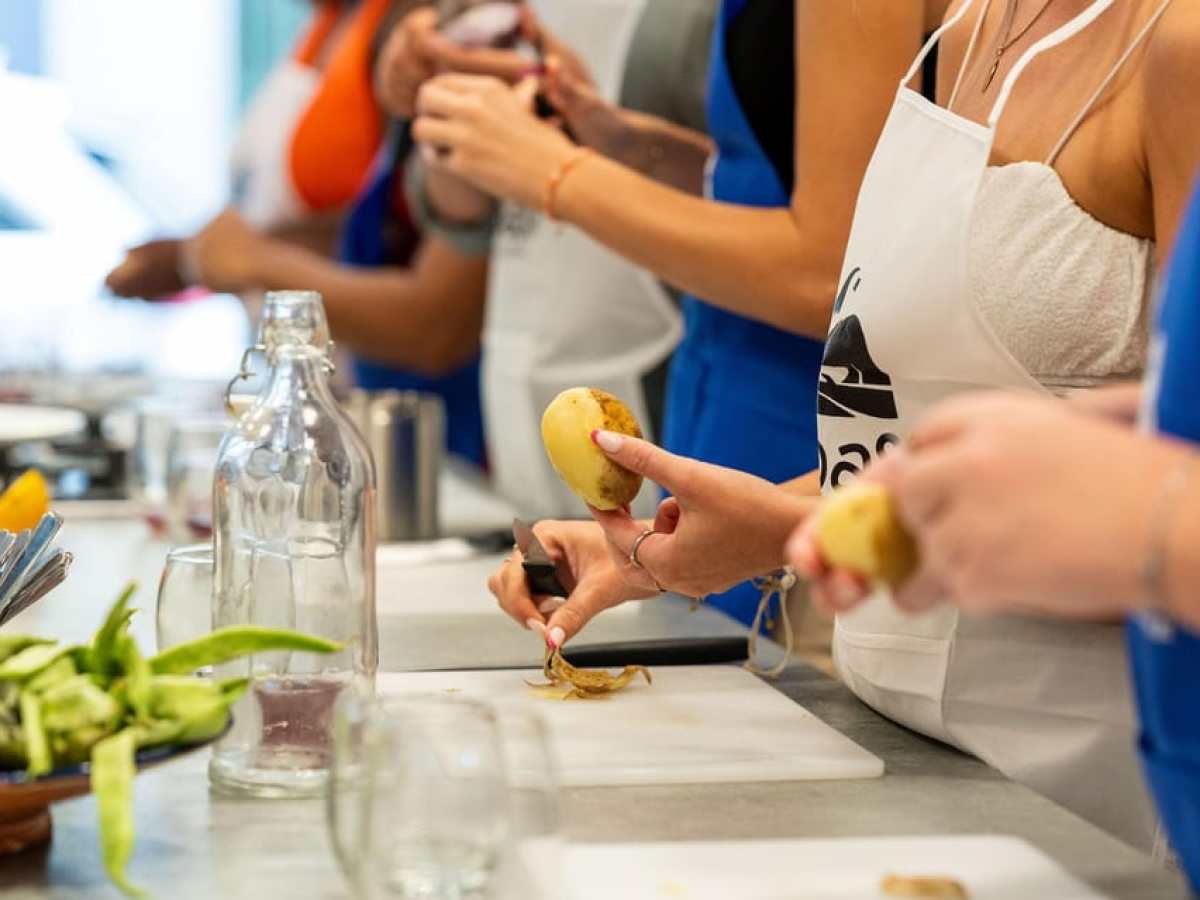 a woman preparing food on a table