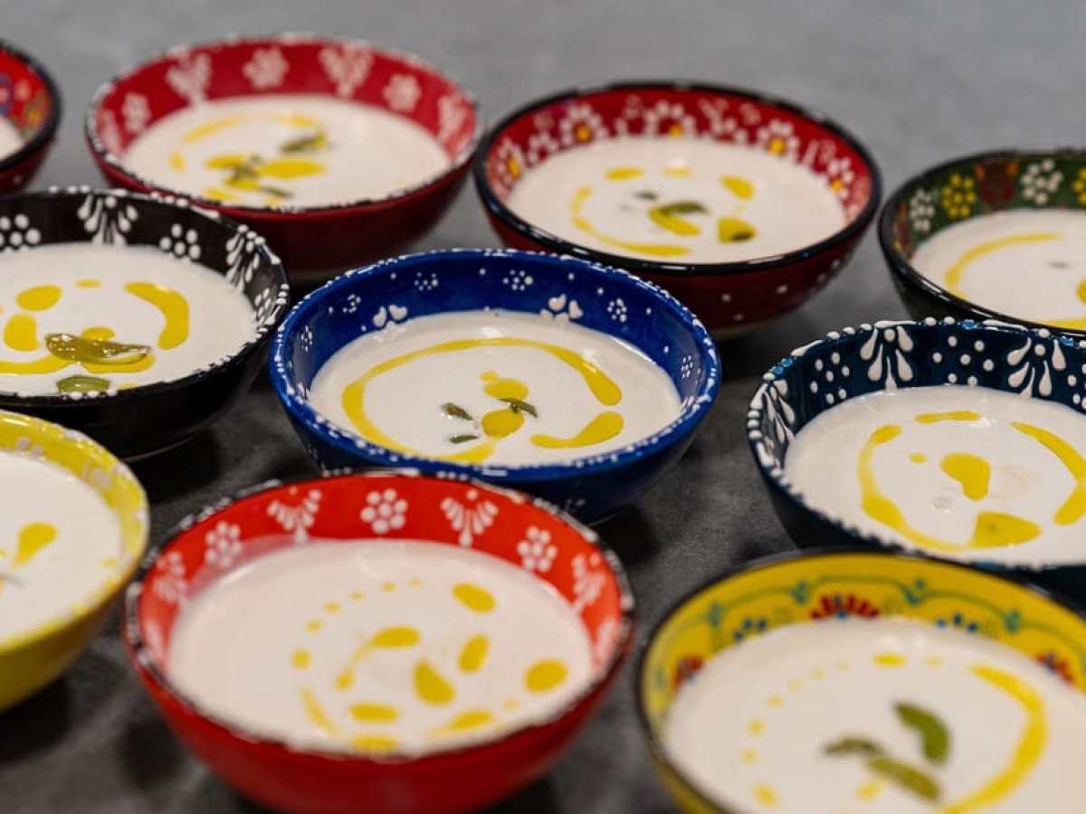 a bowl of food sitting on a table