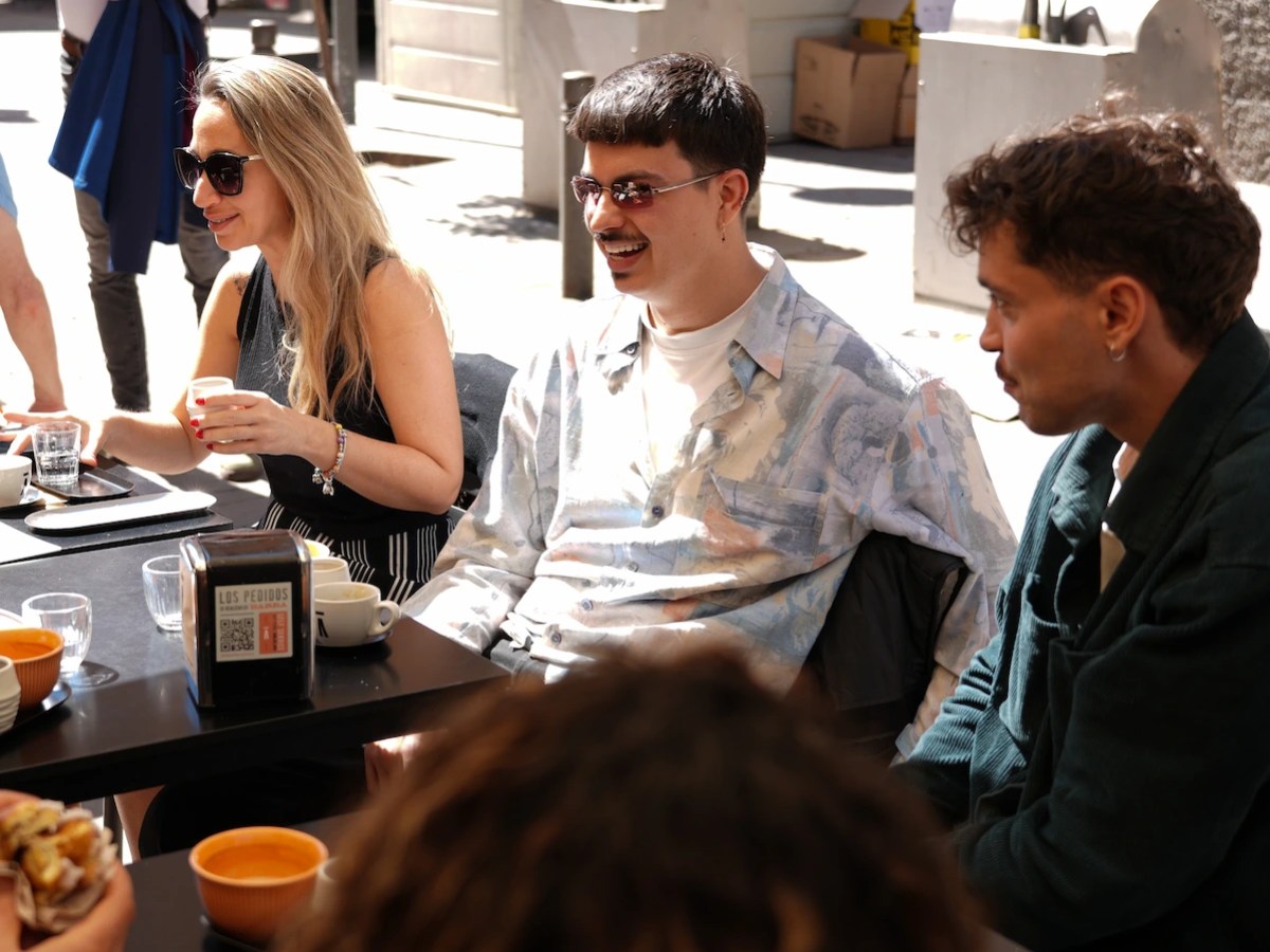 a group of people sitting at a table