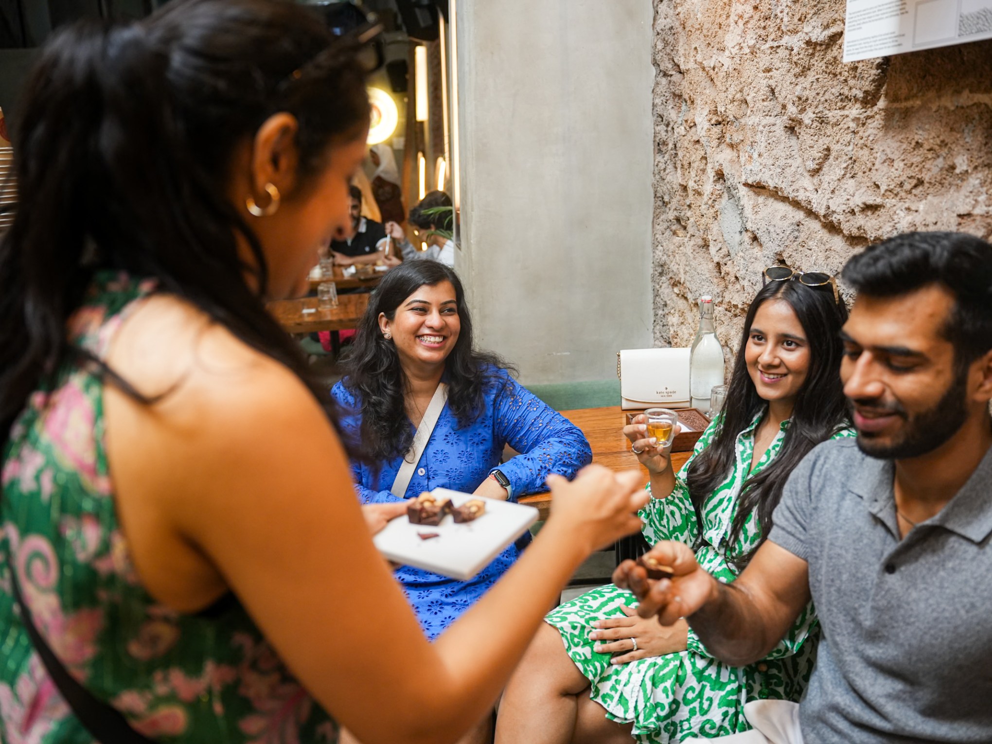 a group of people sitting at a table