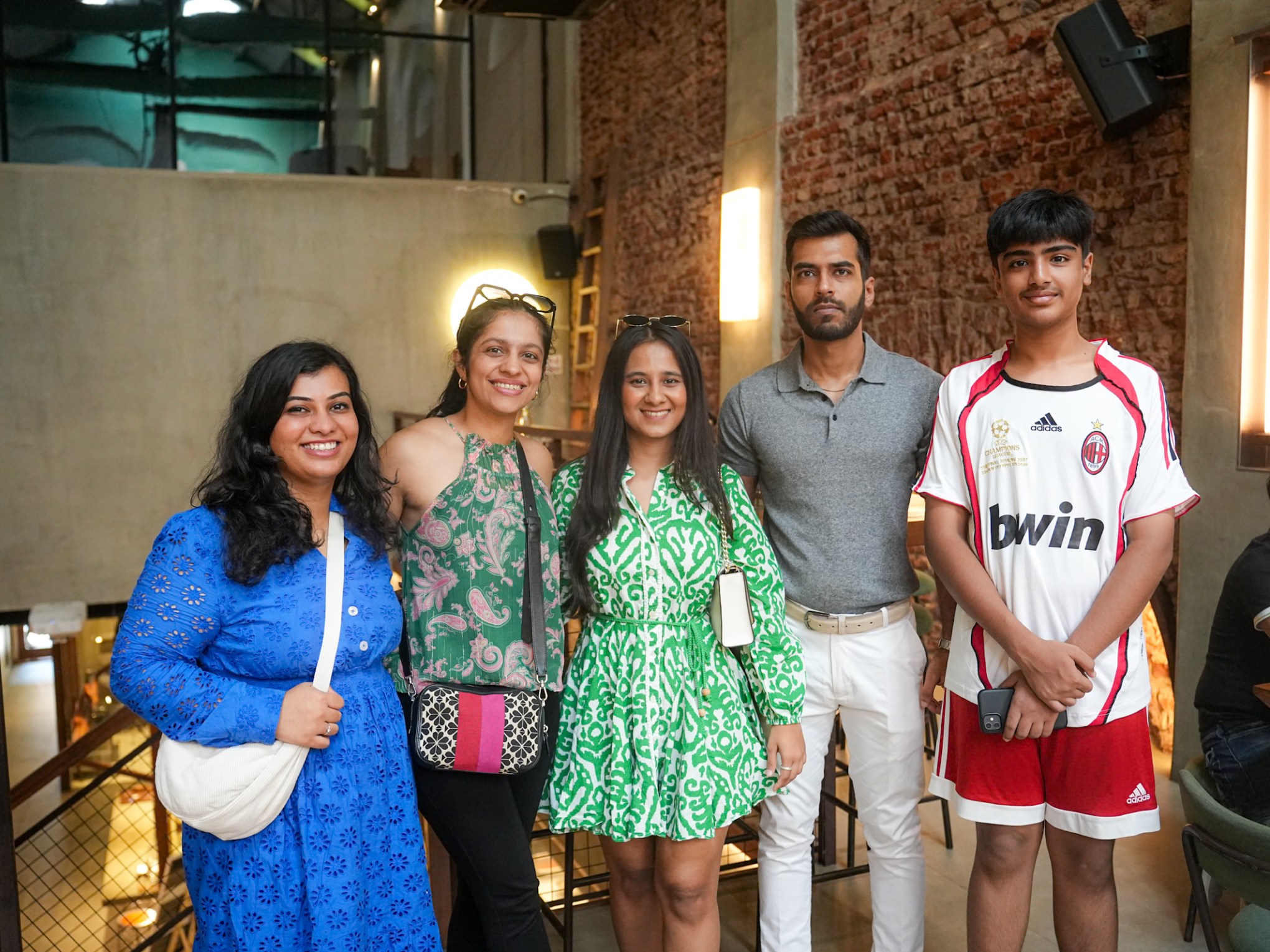 a group of people posing for a photo