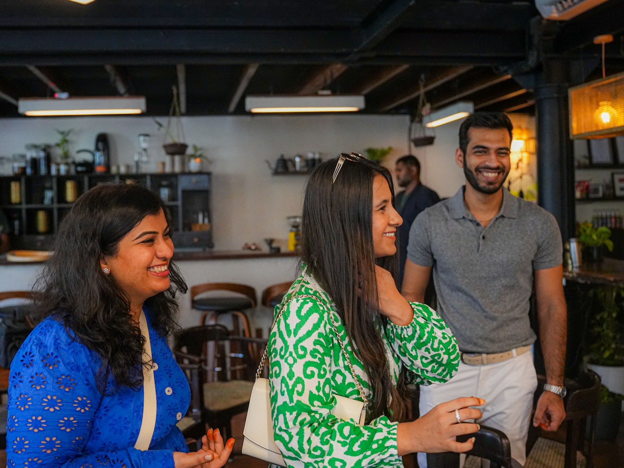a group of people standing in a room