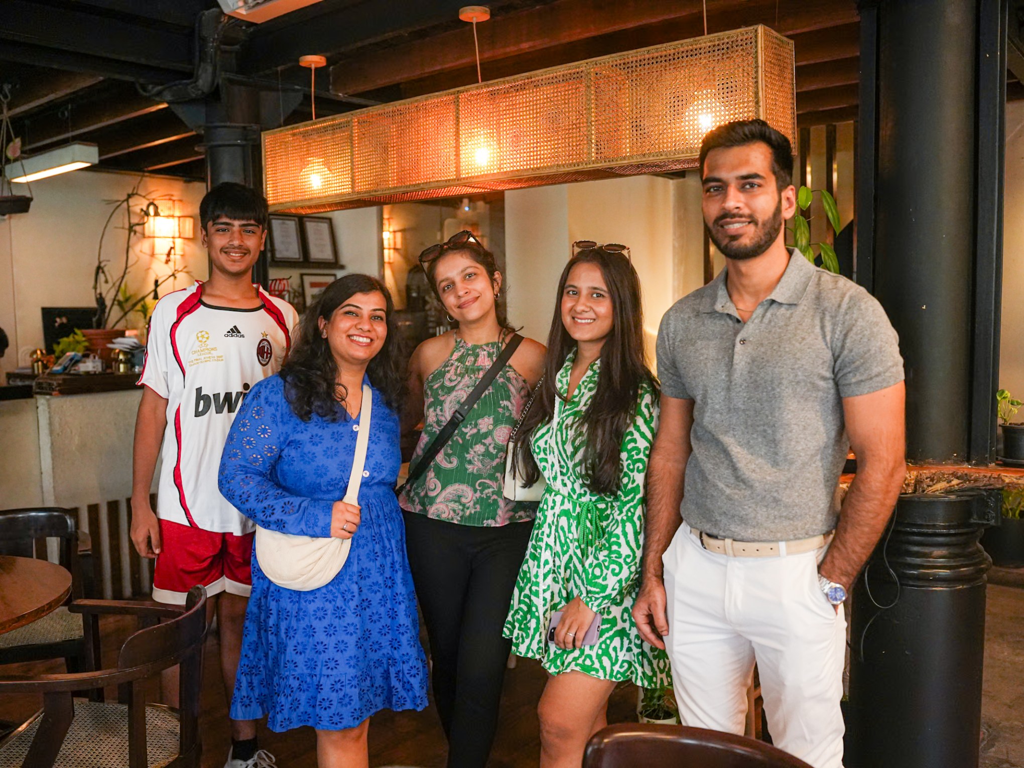 a group of people posing for the camera