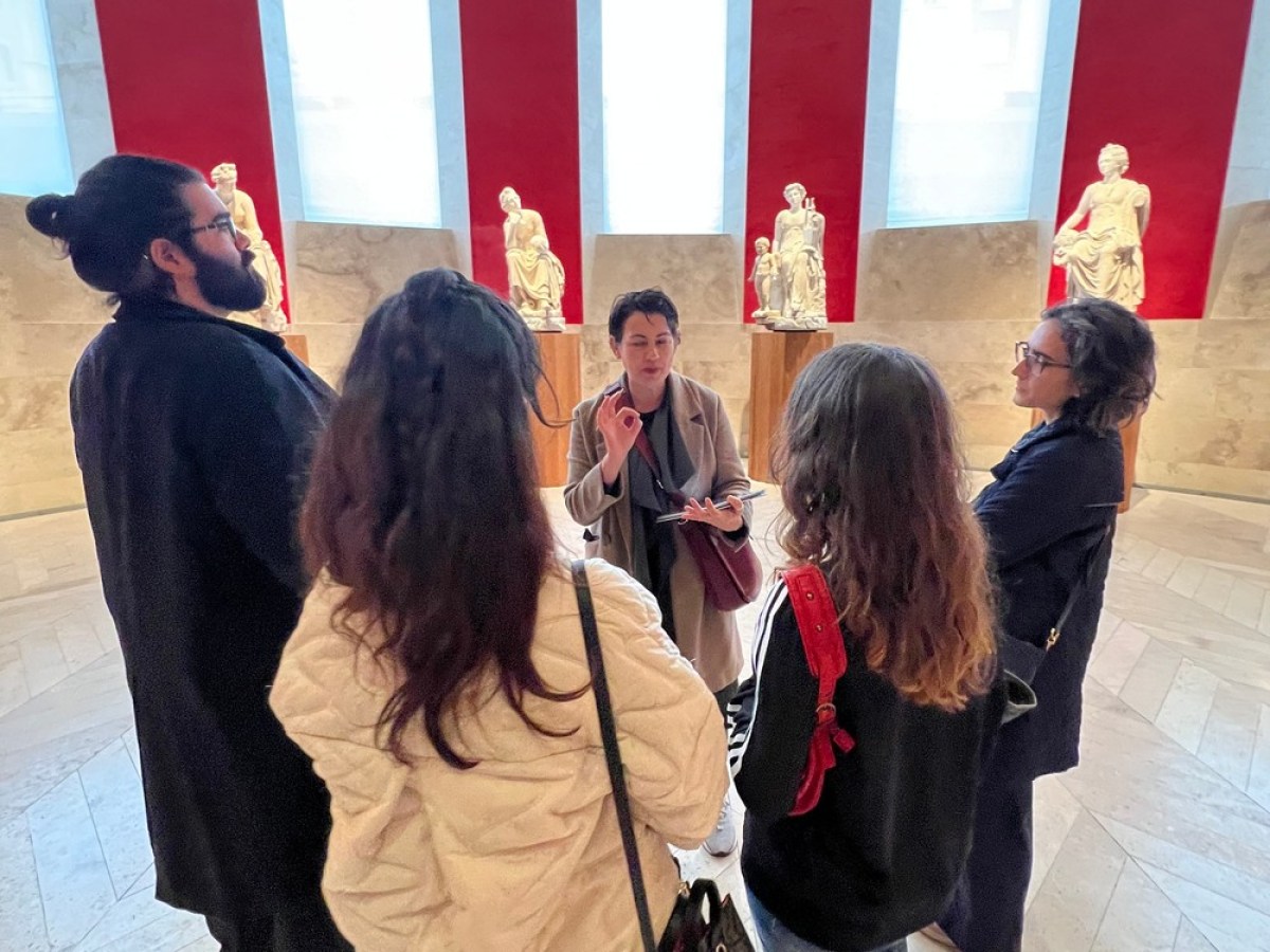 a group of people standing in a room