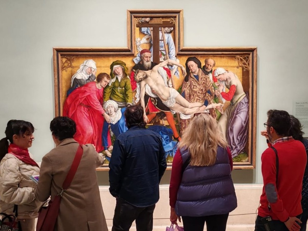 a group of people standing in a room