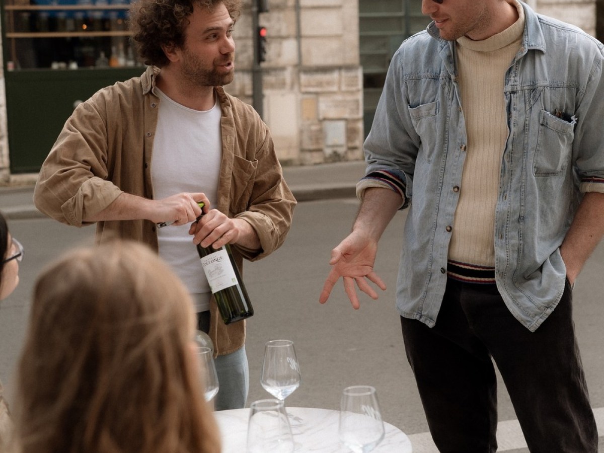 a group of people that are talking to each other