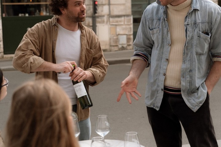a group of people that are talking to each other