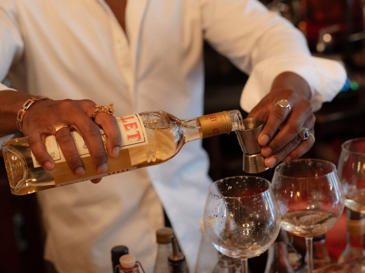 a man holding a wine glass