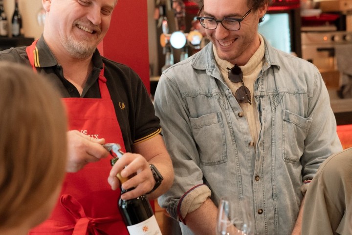 a group of people sitting at a table