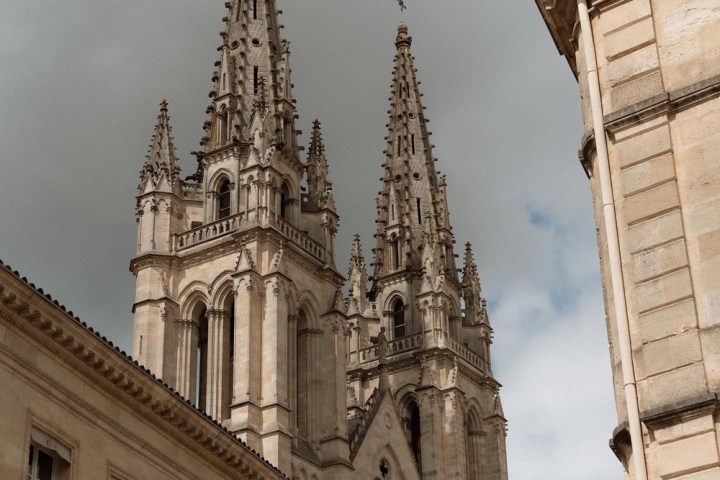 a large clock tower in front of a building