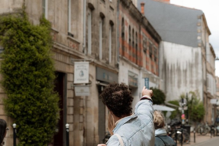 a man and a woman walking down a street